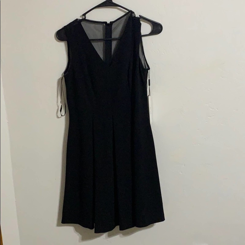 Calvin Klein BNWT size 4 p black